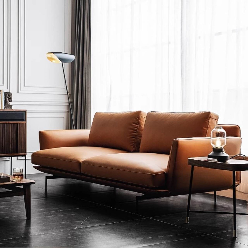 Orange microfiber leather sofa with minimalist design, sleek style, and 88.58-inch length for comfortable seating