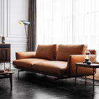 Orange microfiber leather sofa with minimalist design, sleek style, and 88.58-inch length for comfortable seating