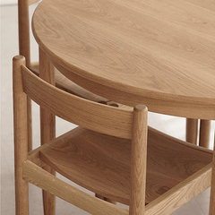 Minimalist Round Table with Comfortable Nesting Chairs