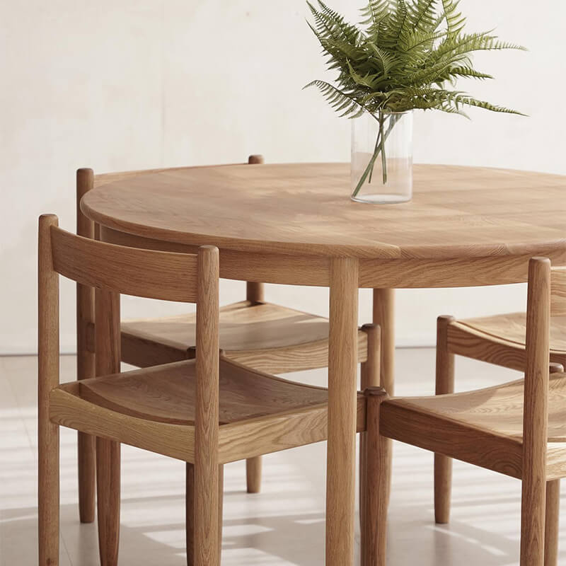 Minimalist Round Table with Comfortable Nesting Chairs