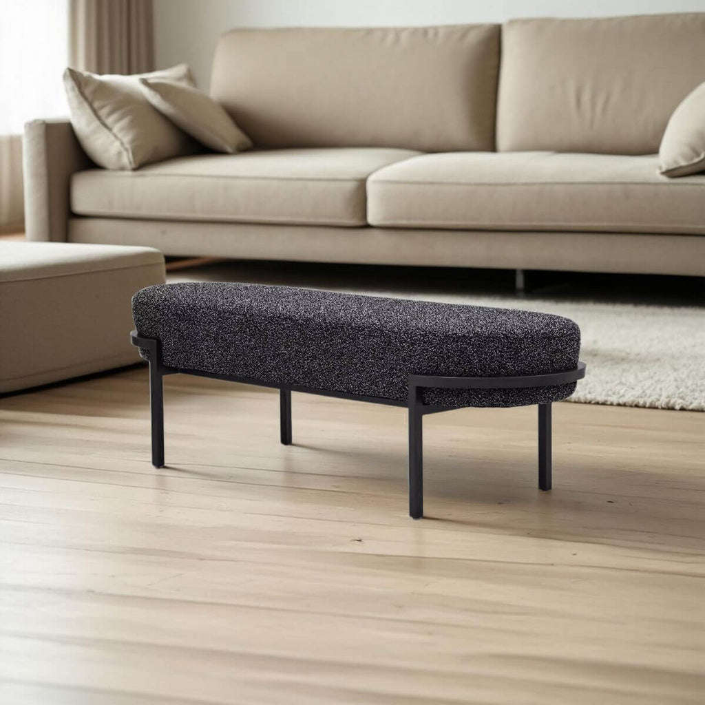 Minimalist Solid-Color Upholstered Bench Featuring Elliptical Silhouette and Floating Metal Base