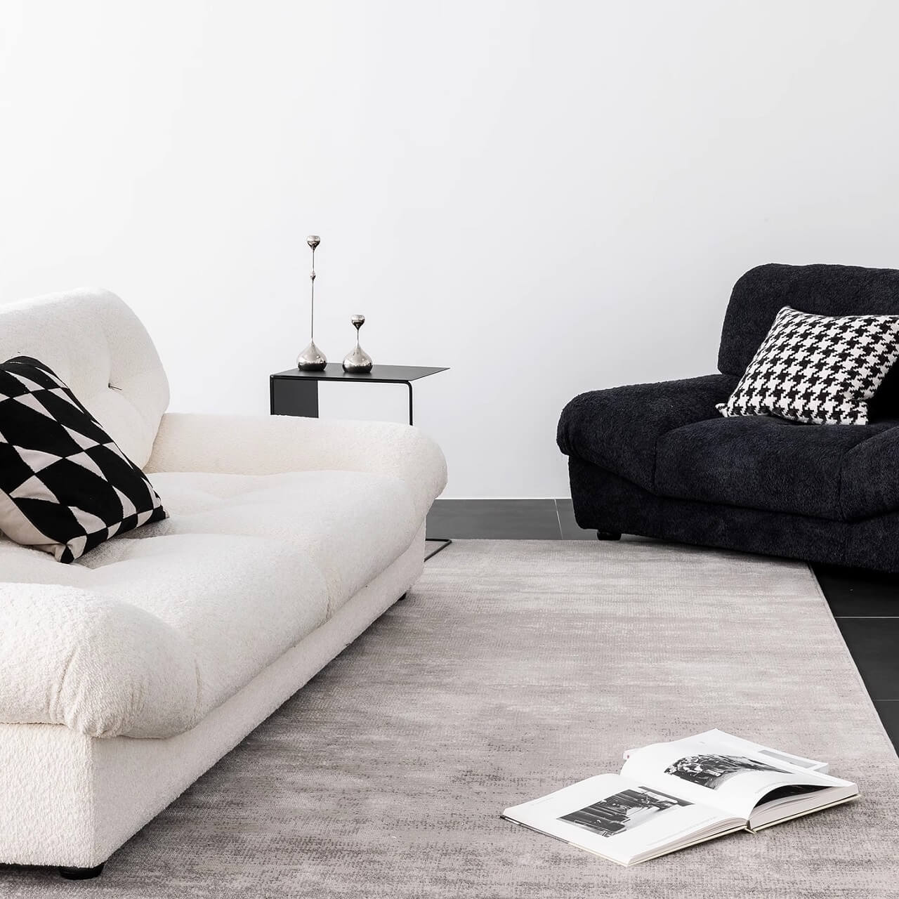 White minimalist boucle sofa with solid wood frame and elegant flared arms