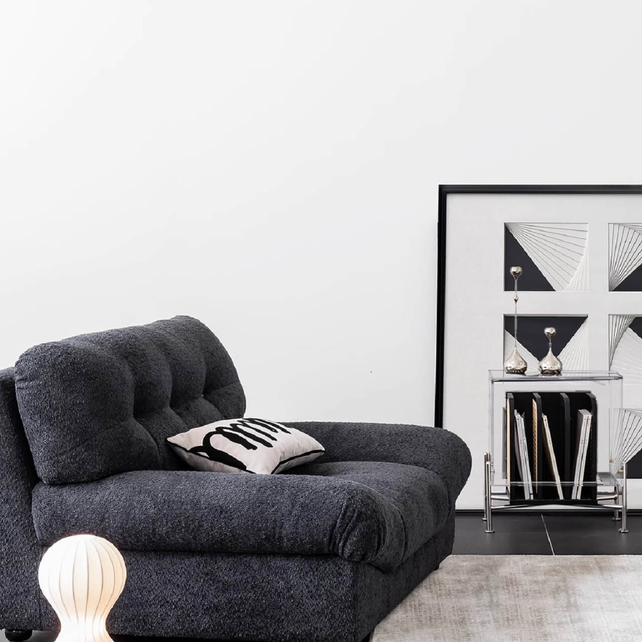 White minimalist boucle sofa with solid wood frame and elegant flared arms