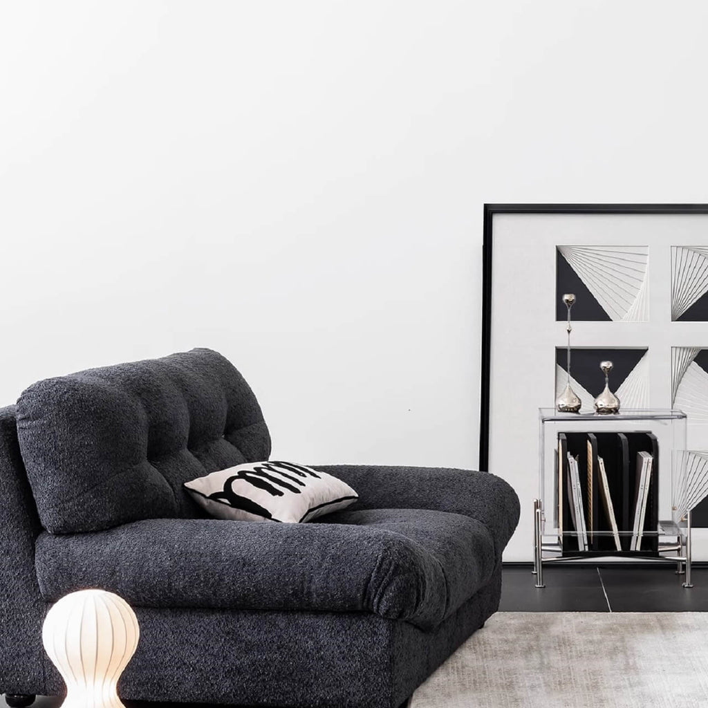 White minimalist boucle sofa with solid wood frame and elegant flared arms