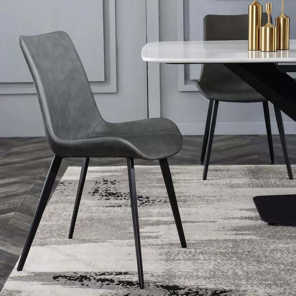 Black faux leather high-back chair with minimalist modern design for stylish seating