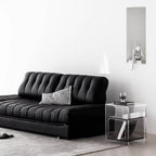 Black faux leather sofa bed with stainless steel frame and pillow arms for modern living rooms