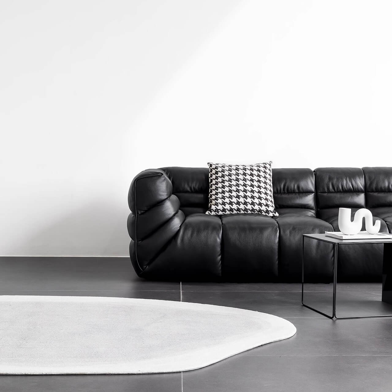 Black microfiber leather sectional sofa with solid wood frame, modern design for living room