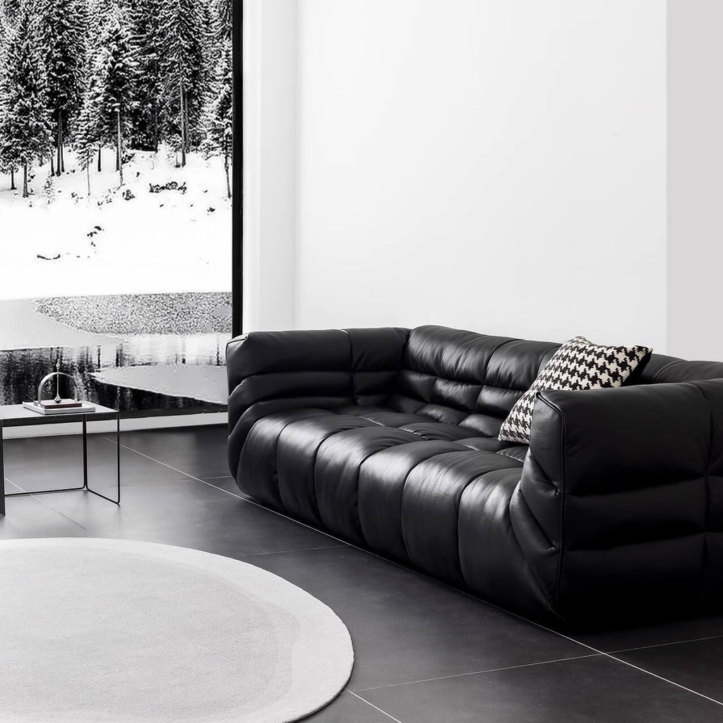 Black microfiber leather sectional sofa with solid wood frame, modern design for living room