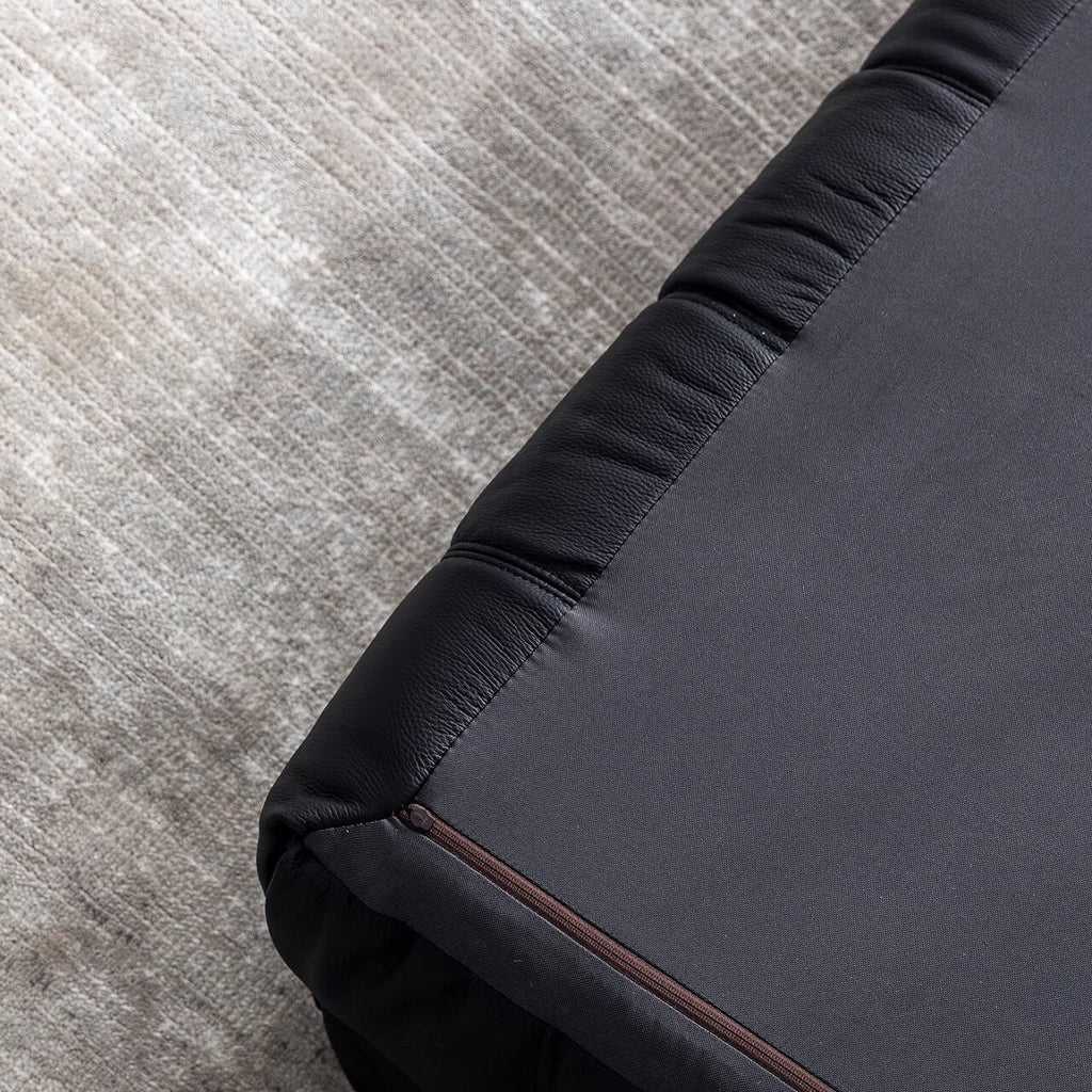 Black microfiber leather sectional sofa with solid wood frame, modern design for living room