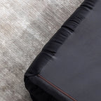 Black microfiber leather sectional sofa with solid wood frame, modern design for living room