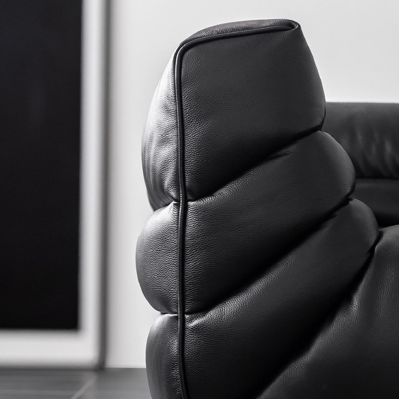 Black microfiber leather sectional sofa with solid wood frame, modern design for living room