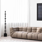 Black microfiber leather sectional sofa with solid wood frame, modern design for living room