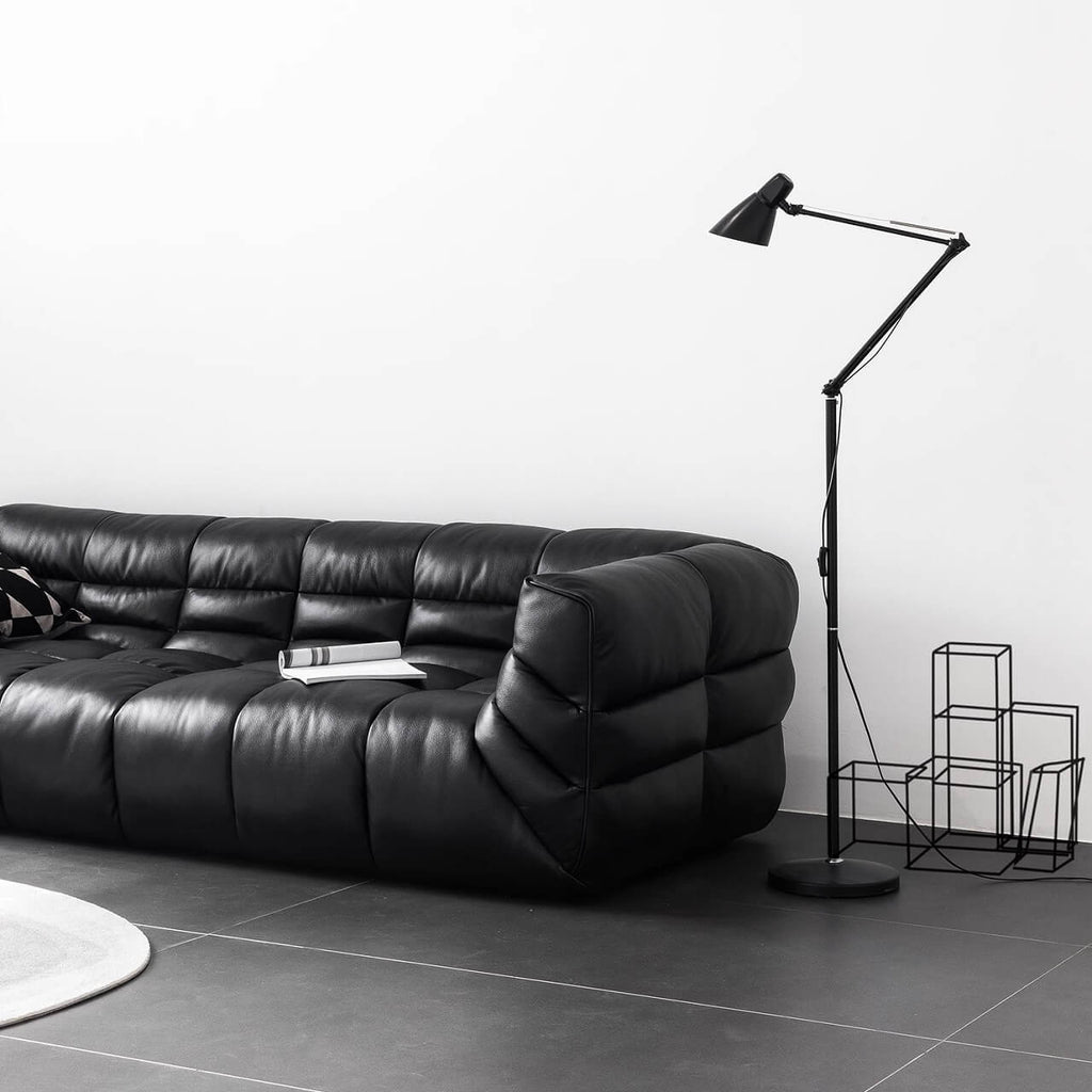 Black microfiber leather sectional sofa with solid wood frame, modern design for living room