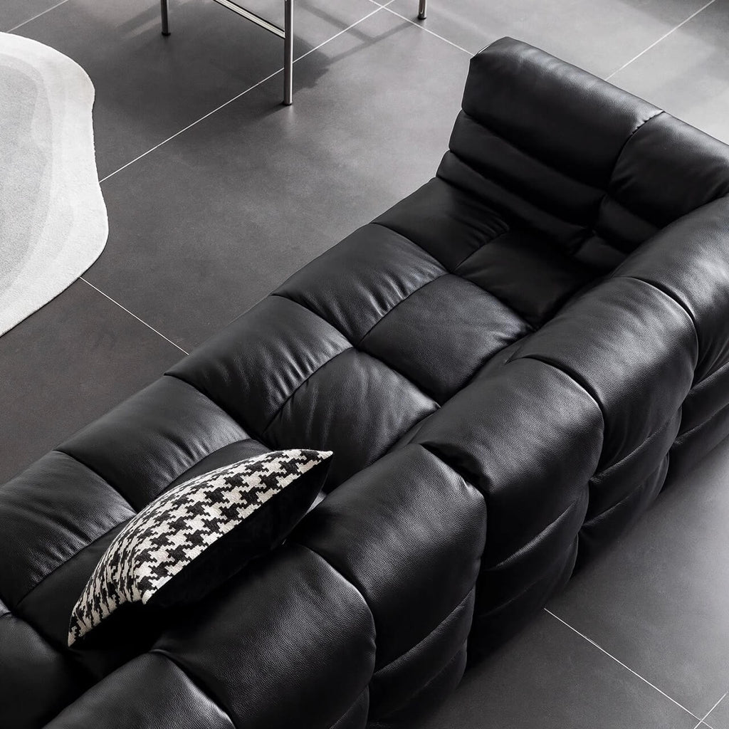 Black microfiber leather sectional sofa with solid wood frame, modern design for living room