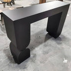 Modern Black Wood Console Table with Sculptural Sled Base