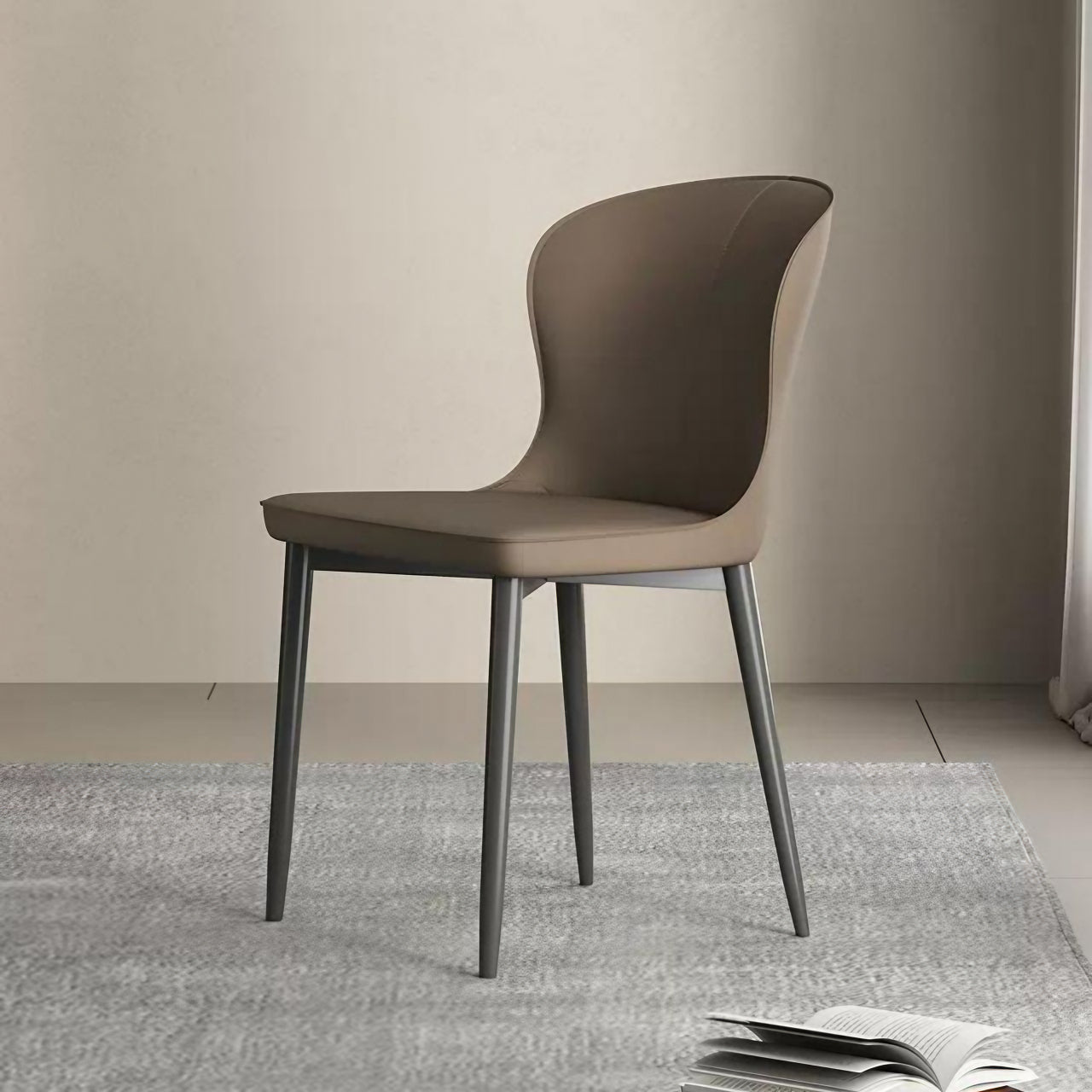 Modern brown leather dining chair with semi-wrapped backrest in a contemporary minimalist design