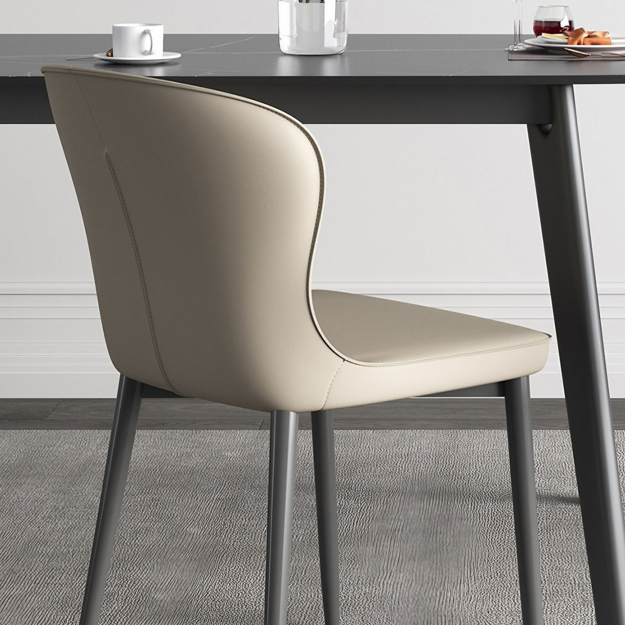 Modern leather dining chair with semi-wrapped backrest in a contemporary minimalist design