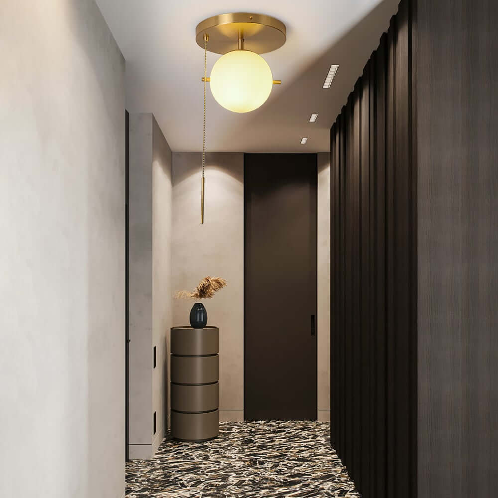 Modern Glass Globe Ceiling Light with Gold Finish and Ambient Glow