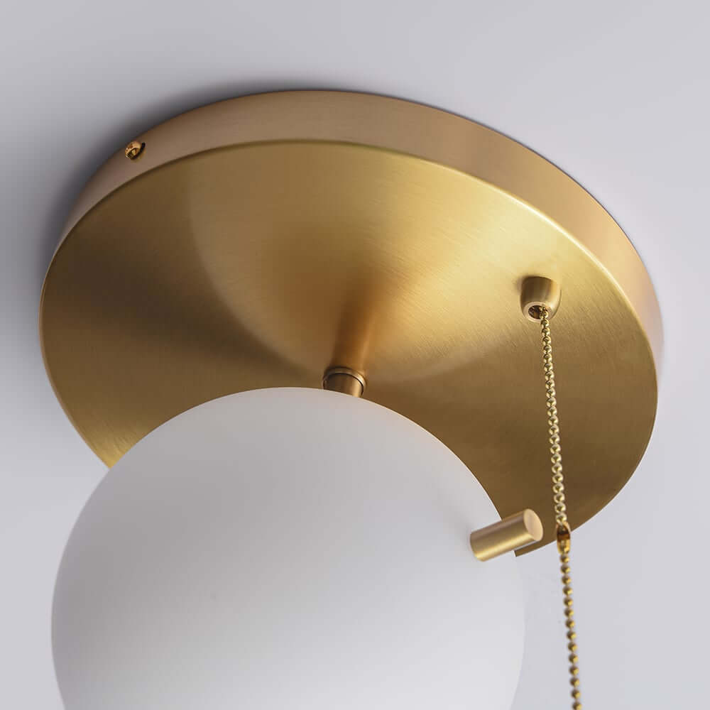Modern Glass Globe Ceiling Light with Gold Finish and Ambient Glow