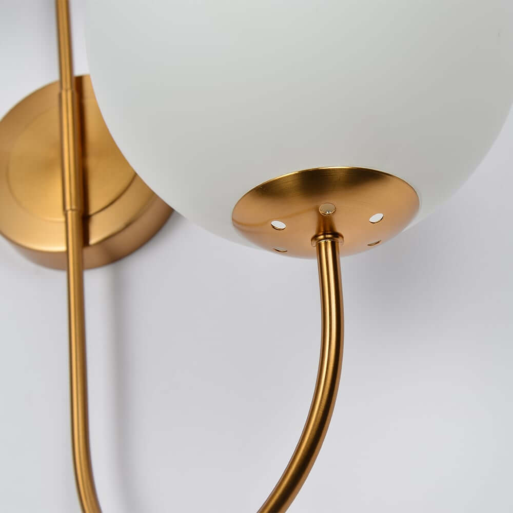 Modern Gold Armed Wall Sconce with Dual White Glass Globes