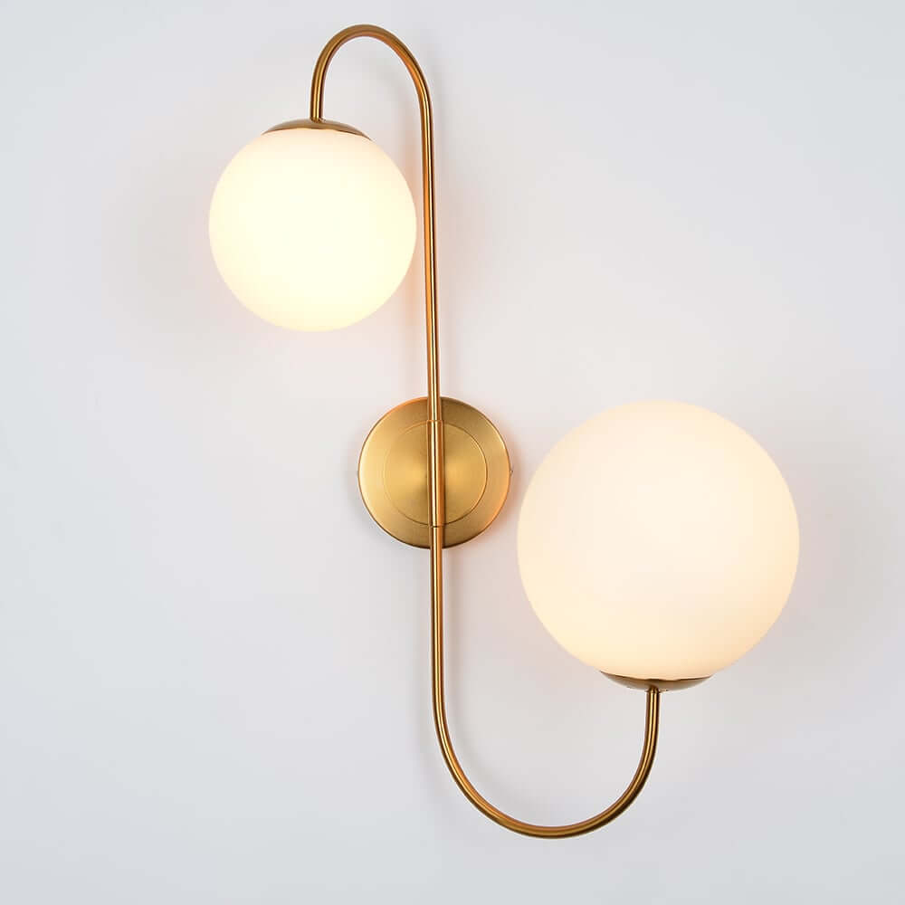 Modern Gold Armed Wall Sconce with Dual White Glass Globes