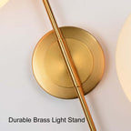 Modern Gold Armed Wall Sconce with Dual White Glass Globes