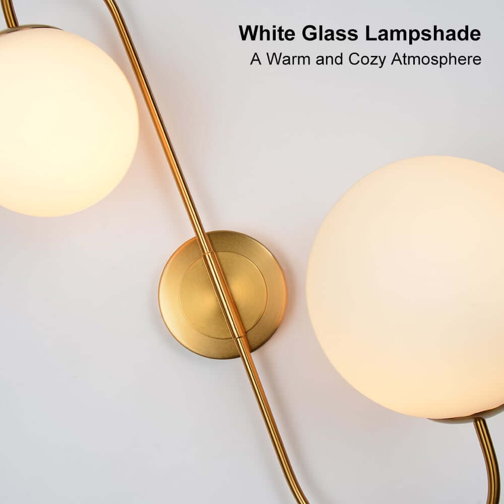 Modern Gold Armed Wall Sconce with Dual White Glass Globes
