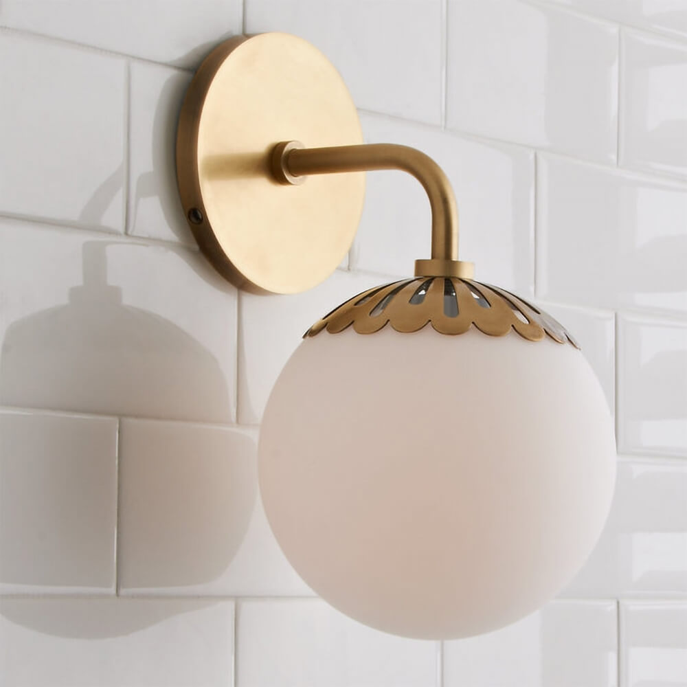 Modern Gold Armed Wall Sconce with Frosted White Glass Globe Shade Main Product Image Main image