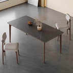 Gray rectangular rock slab tabletop dining table with solid wood support