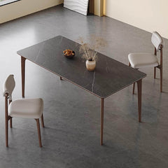 Sophisticated rectangular dining table with gray rock slab and wooden legs