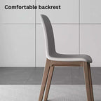 Single modern grey leather dining chair with durable fan-back design and minimalist style