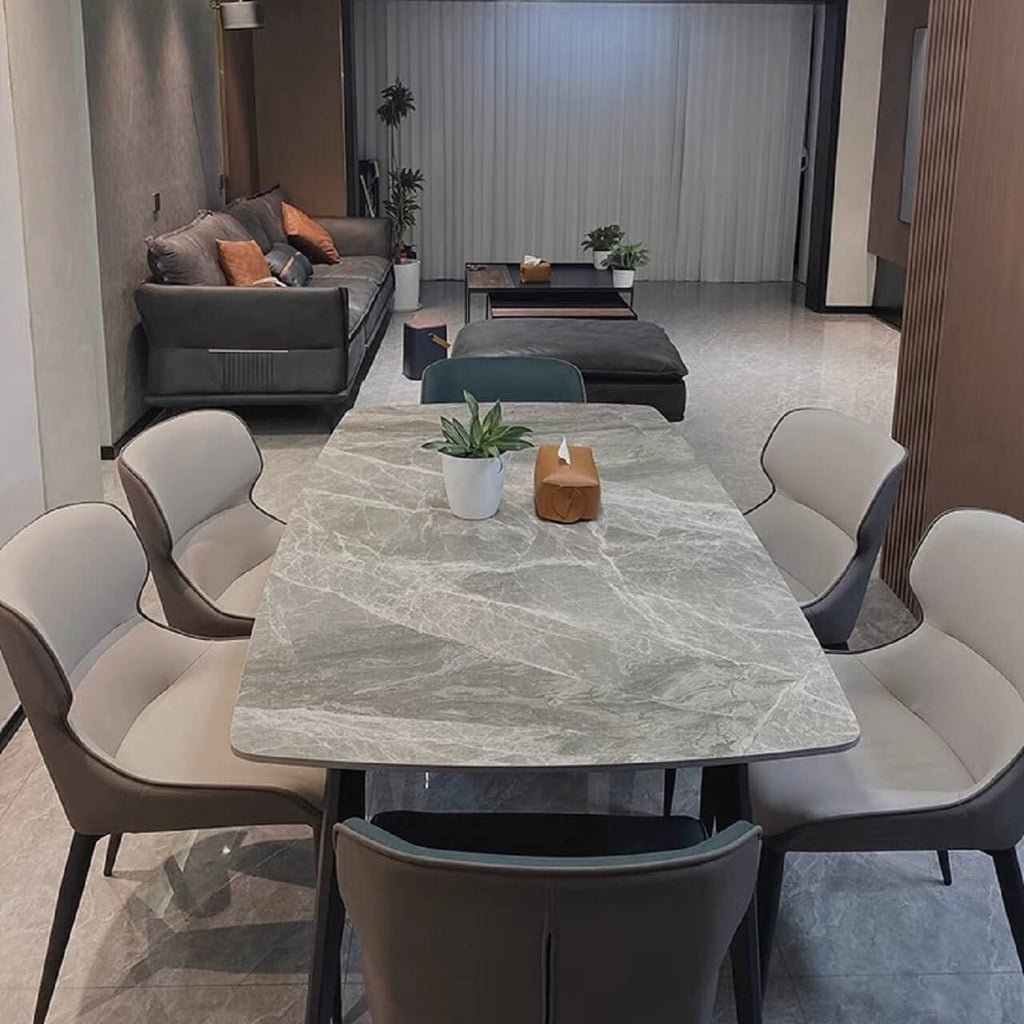 Modern grey rectangular dining table with bright rock tabletop and carbon steel legs