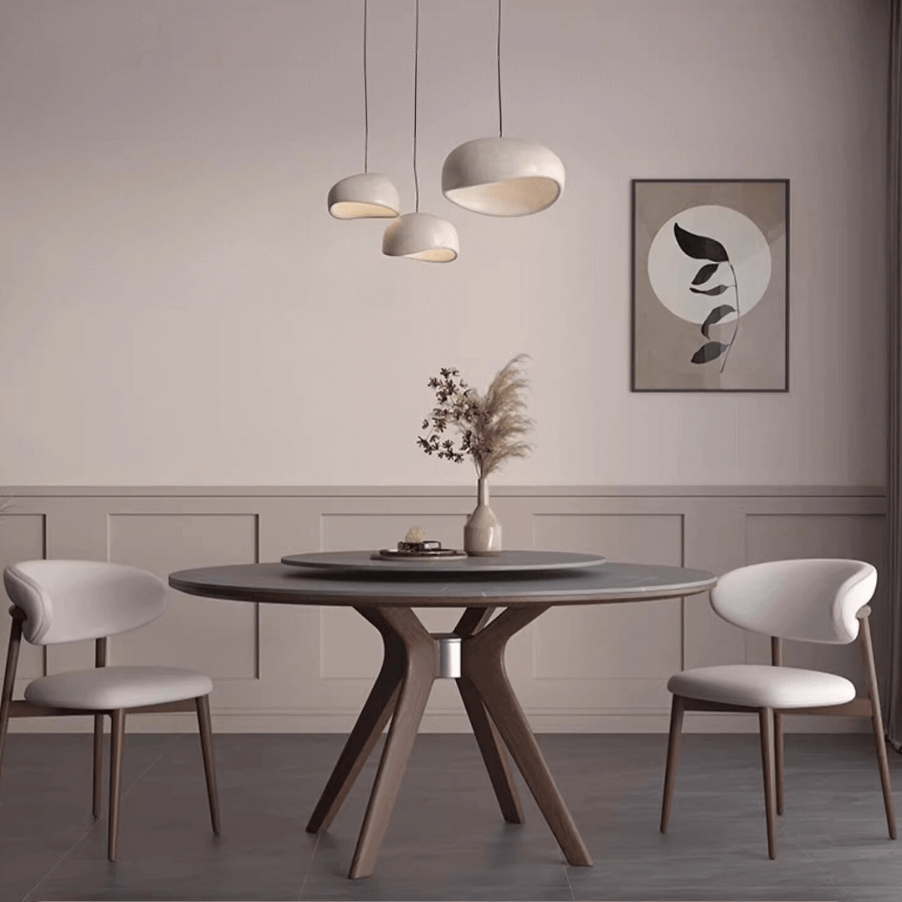 Contemporary gray round dining table with rotating center in a modern home setting