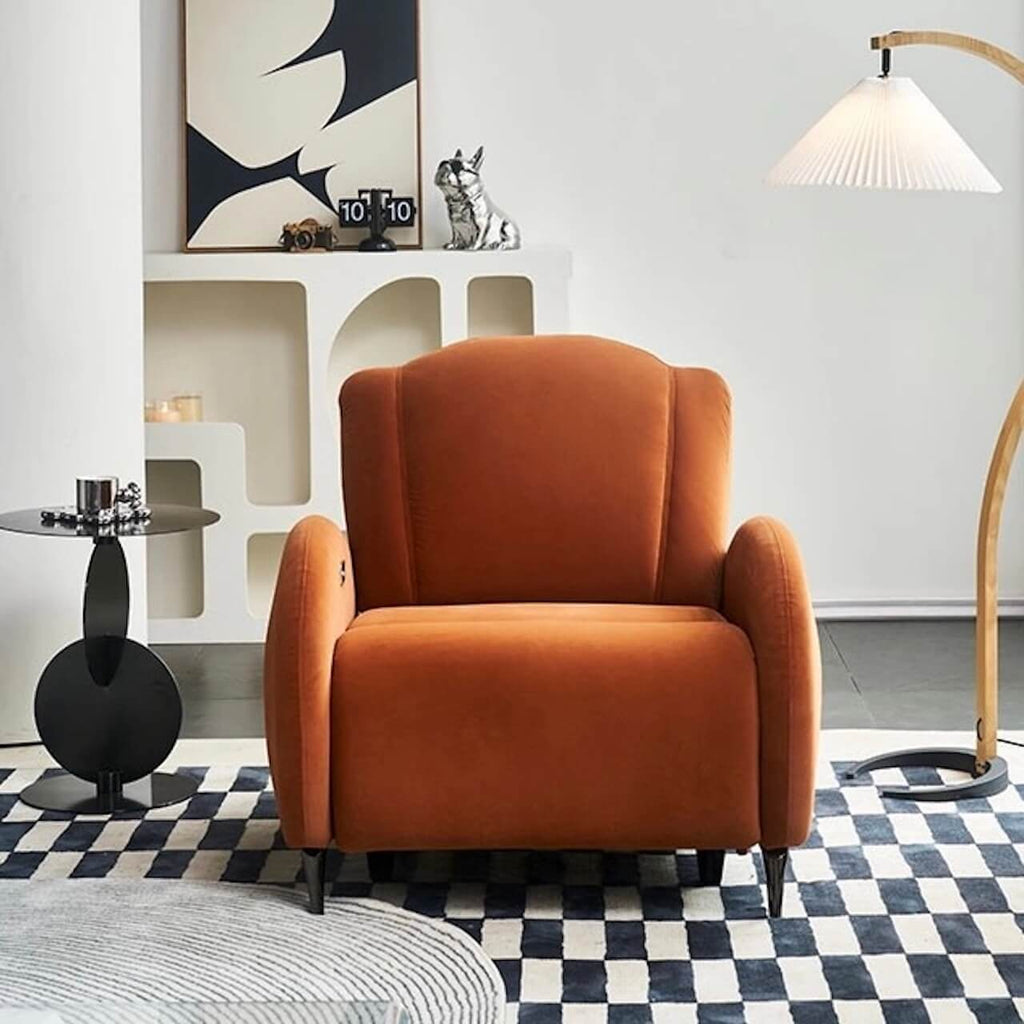 Orange velvet electric recliner chair with modern shell shape design