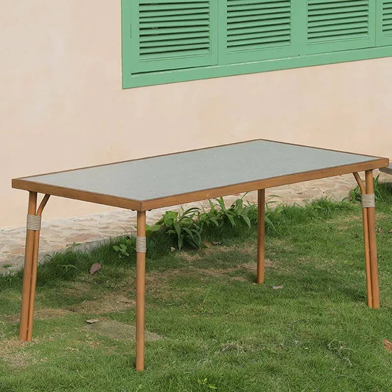 Modern Outdoor Coffee Table with Woven Legs and Matte Grey Top