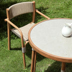 Modern Outdoor Coffee Table with Woven Legs and Matte Grey Top