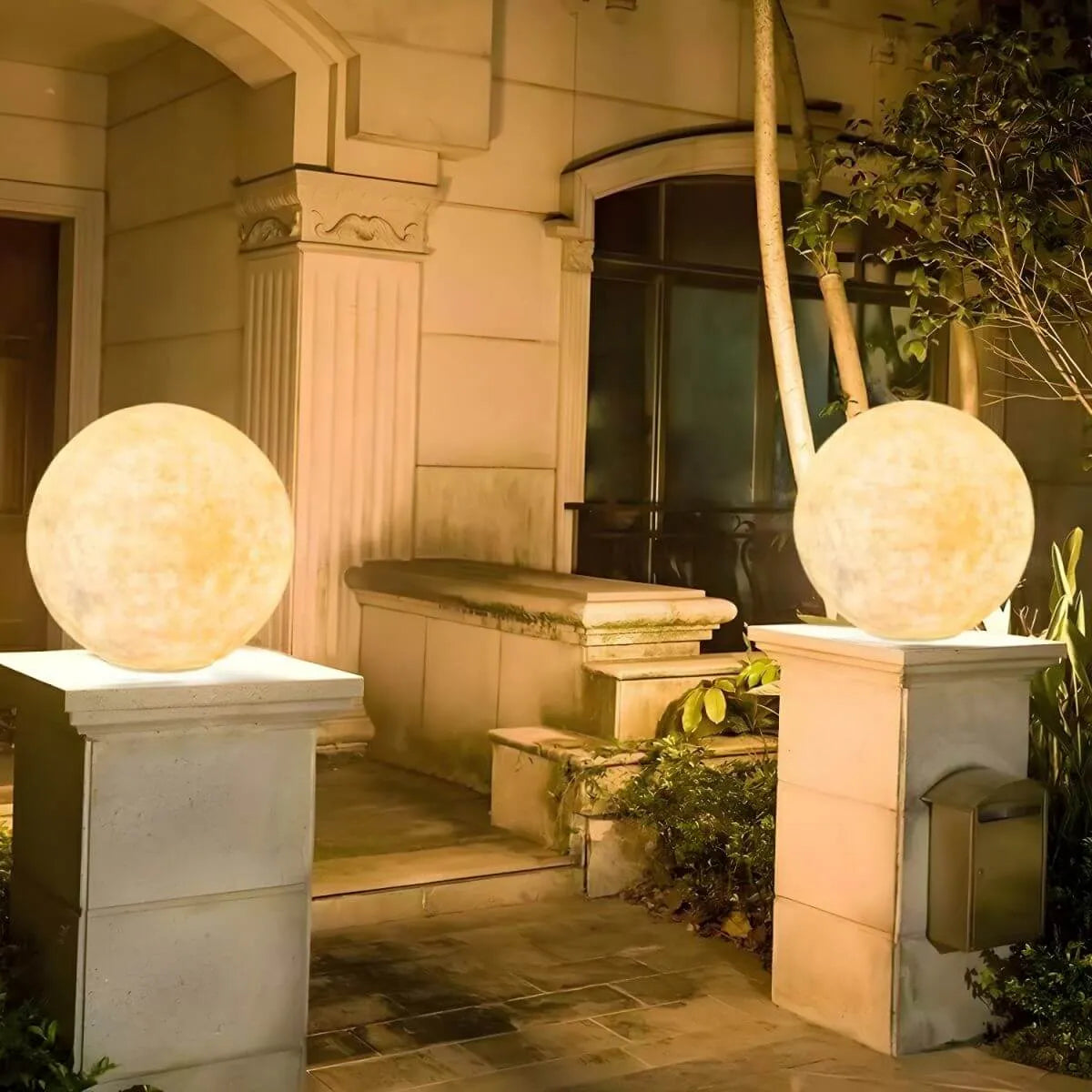 Modern Round Resin Outdoor Table Lamp with Natural Stone Texture Main Product Image Imagen principal del producto