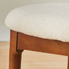 Modern Upholstered Side Chair with Open-Back Design and Wood Legs