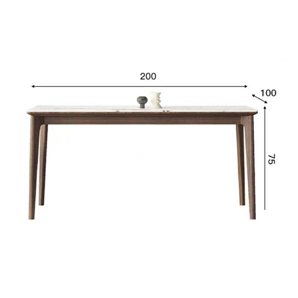 White rectangular sintered stone tabletop dining table with solid wood base in minimalist design
