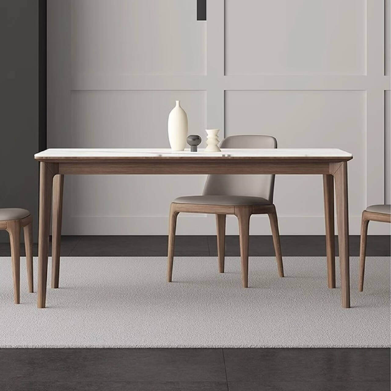 White rectangular sintered stone tabletop dining table with solid wood base in minimalist design