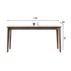 White rectangular sintered stone tabletop dining table with solid wood base in minimalist design
