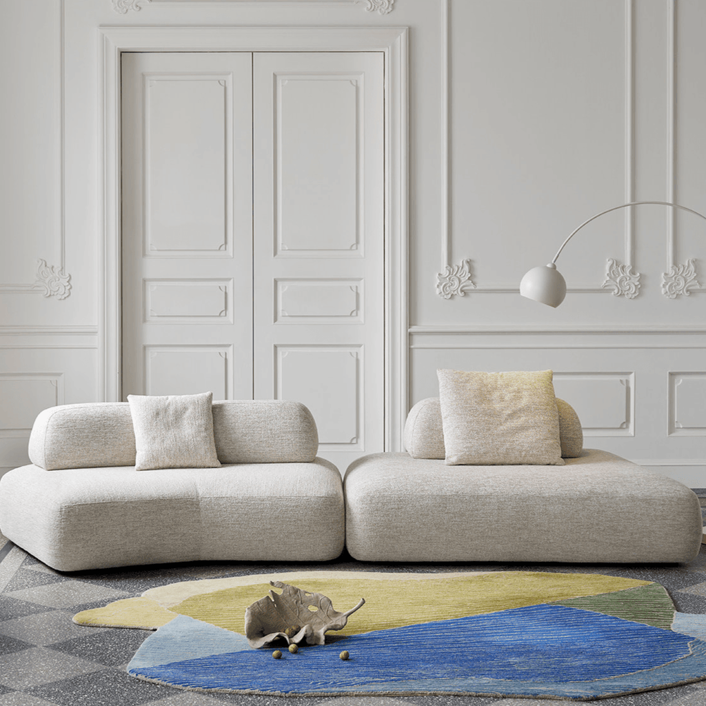 Modular Pebble Sofa with Movable Backs for Flexible Living Spaces