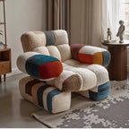 Nordic Geometric Accent Chair in Earth Tone Patchwork With Plush Comfort