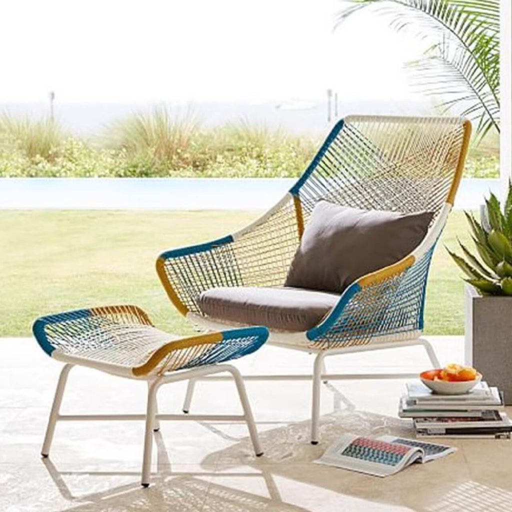 Outdoor PE rattan loveseat with metal legs and cushion pillows for patio seating