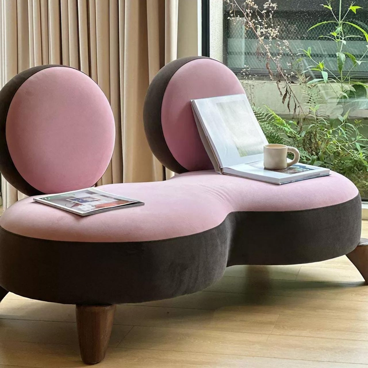 Elegant Pink Velvet Twin Sofa in Living Room Setting