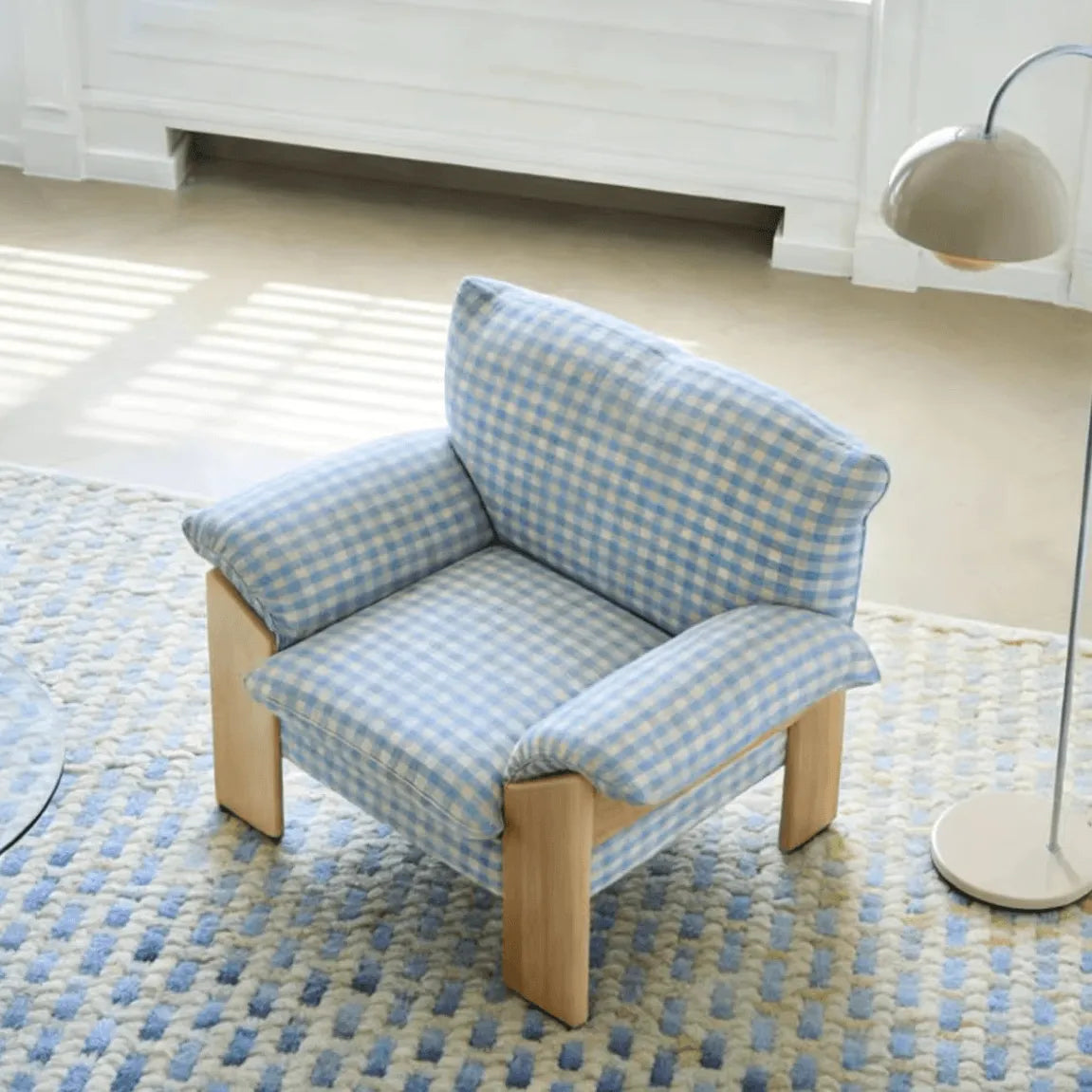 Plaid Linen Lounge Chair With Exposed Wood Frame and Cozy Wraparound Seat