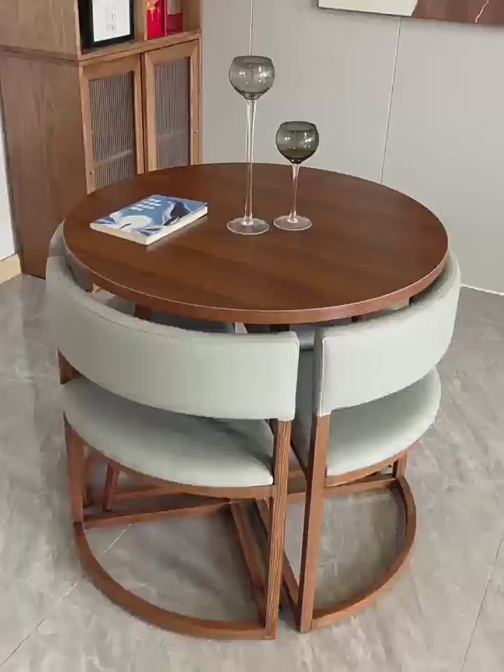 Versatile Round Table With Comfortable Nesting Chairs