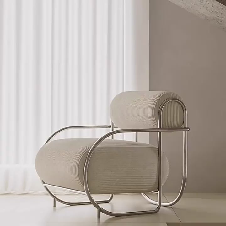 Sculptural Stainless Steel Lounge Chair with Textured Fabric & Rounded Armrests