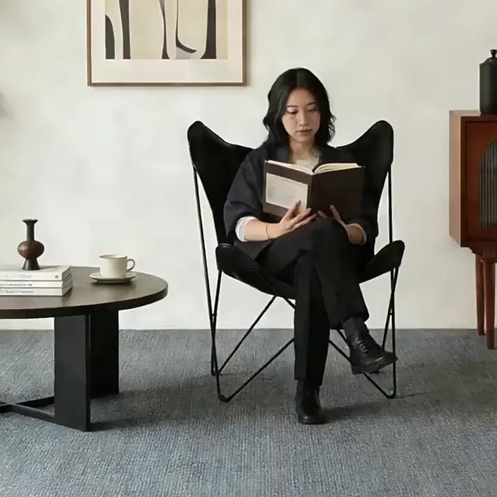 Sculptural Leather Butterfly Chair with Ergonomic Wingback Design