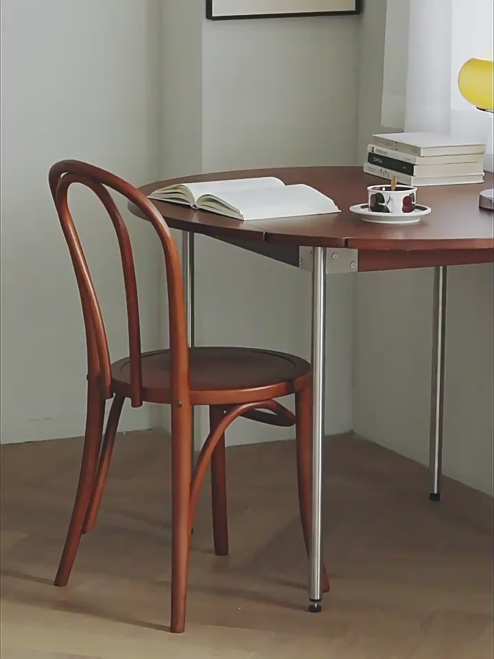 Ergonomic Bentwood Dining Chair with Sculptural Frame and Smooth Finish
